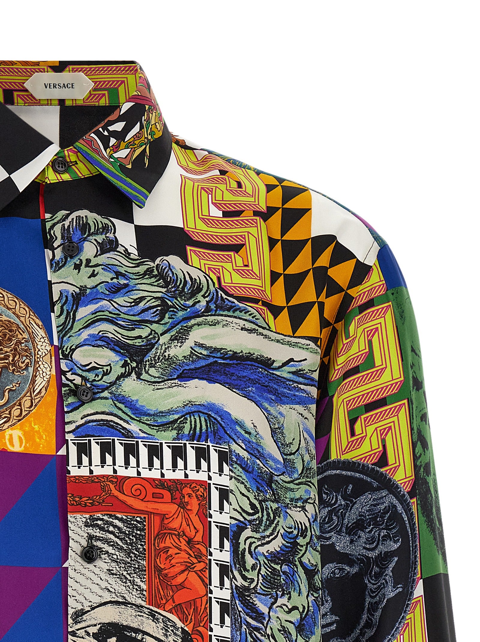 Elevate your wardrobe with the Versace Multicolor Silk Blouse, a masterpiece of pure silk twill showcasing the iconic ‘Medusa Collage’ print, embodying luxury and artistry.