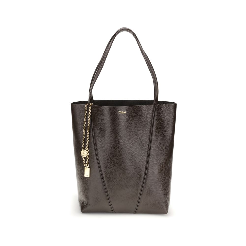 Discover the Chloé Brown Calf Leather Bos Taurus Shoulder Bag, a masterpiece of exquisite craftsmanship and timeless elegance, perfect for elevating your style.