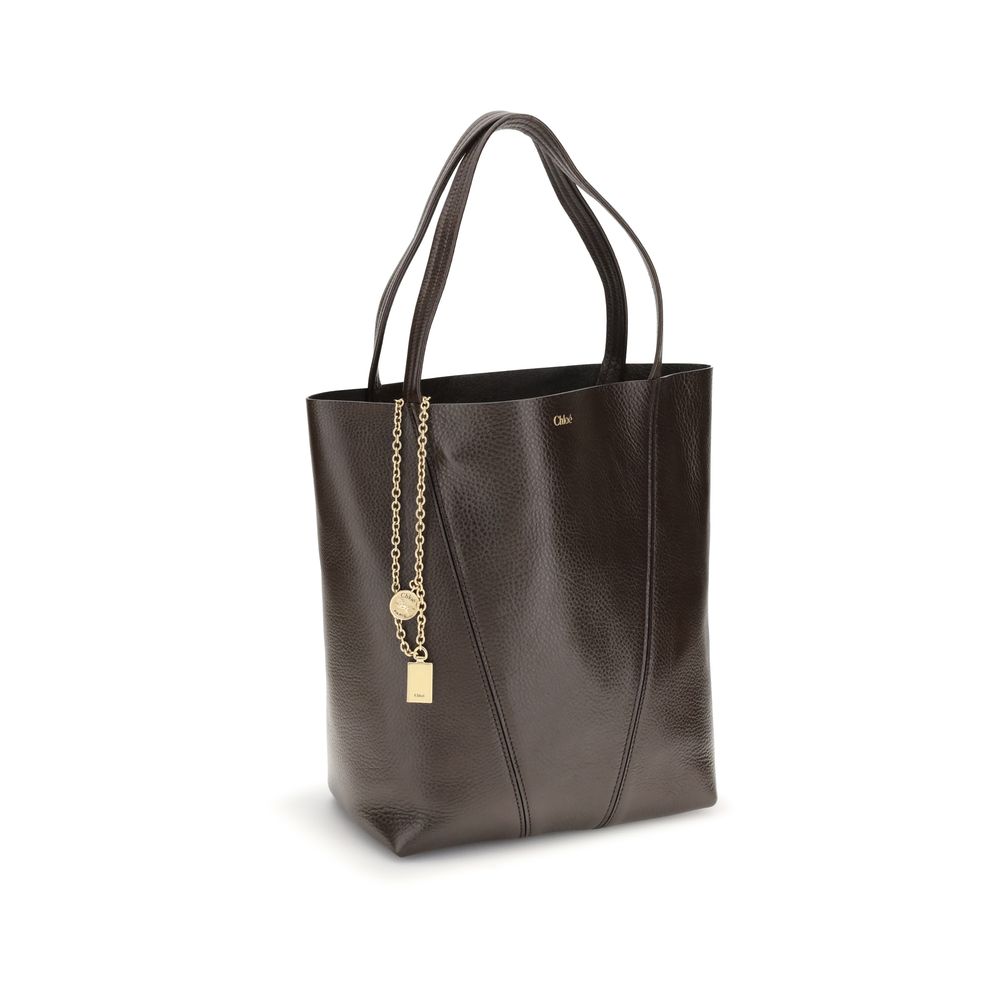 Elevate your style with the Chloé Brown Calf Leather Bos Taurus Shoulder Bag, a masterpiece of exquisite craftsmanship and timeless luxury, perfect for any occasion.