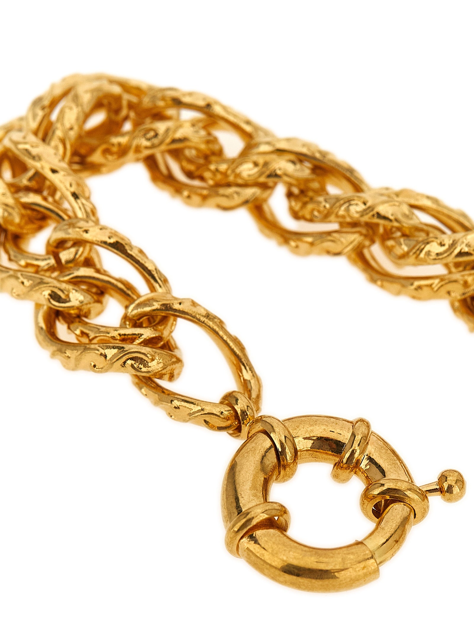 Indulge in the allure of the Saint Laurent Gold Brass Bracelet, a sculptural masterpiece that embodies timeless elegance and sophistication, perfect for the discerning connoisseur.