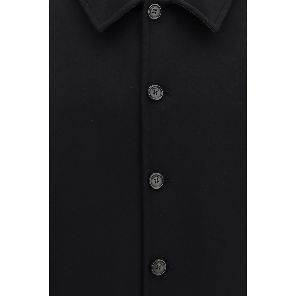 Indulge in the refined elegance of the Ferragamo Black Wool Oves Aries Biker Jacket, crafted from luxurious wool and cashmere for a contemporary silhouette that exudes sophistication.