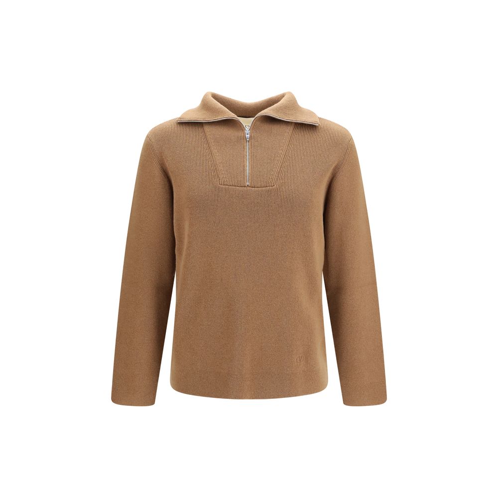 Elevate your wardrobe with the Valentino Garavani Brown Wool Oves Aries Sweatshirt, a masterpiece of refined craftsmanship in luxurious fleece wool, embodying timeless elegance.