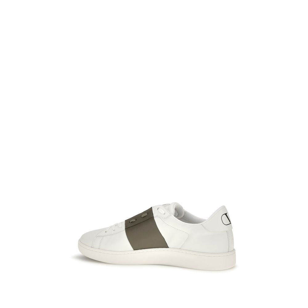 Elevate your style with Valentino Garavani's White Calf Leather Bos Taurus Low Top Sneakers, where timeless design meets unparalleled craftsmanship for the discerning individual.