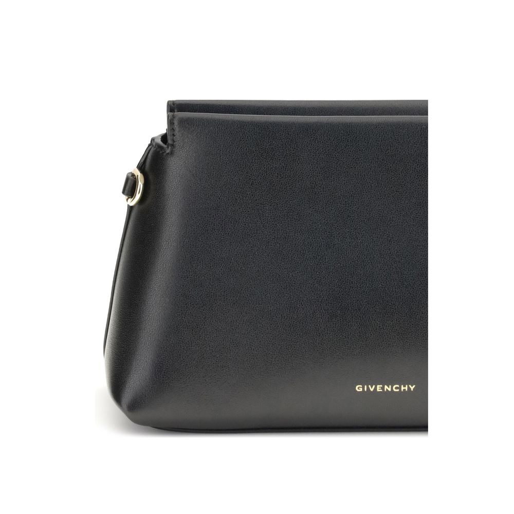 Indulge in the elegance of Givenchy's Black Calf Leather Bos Taurus Wallet, a masterpiece of refined craftsmanship and luxurious design, perfect for the discerning individual.