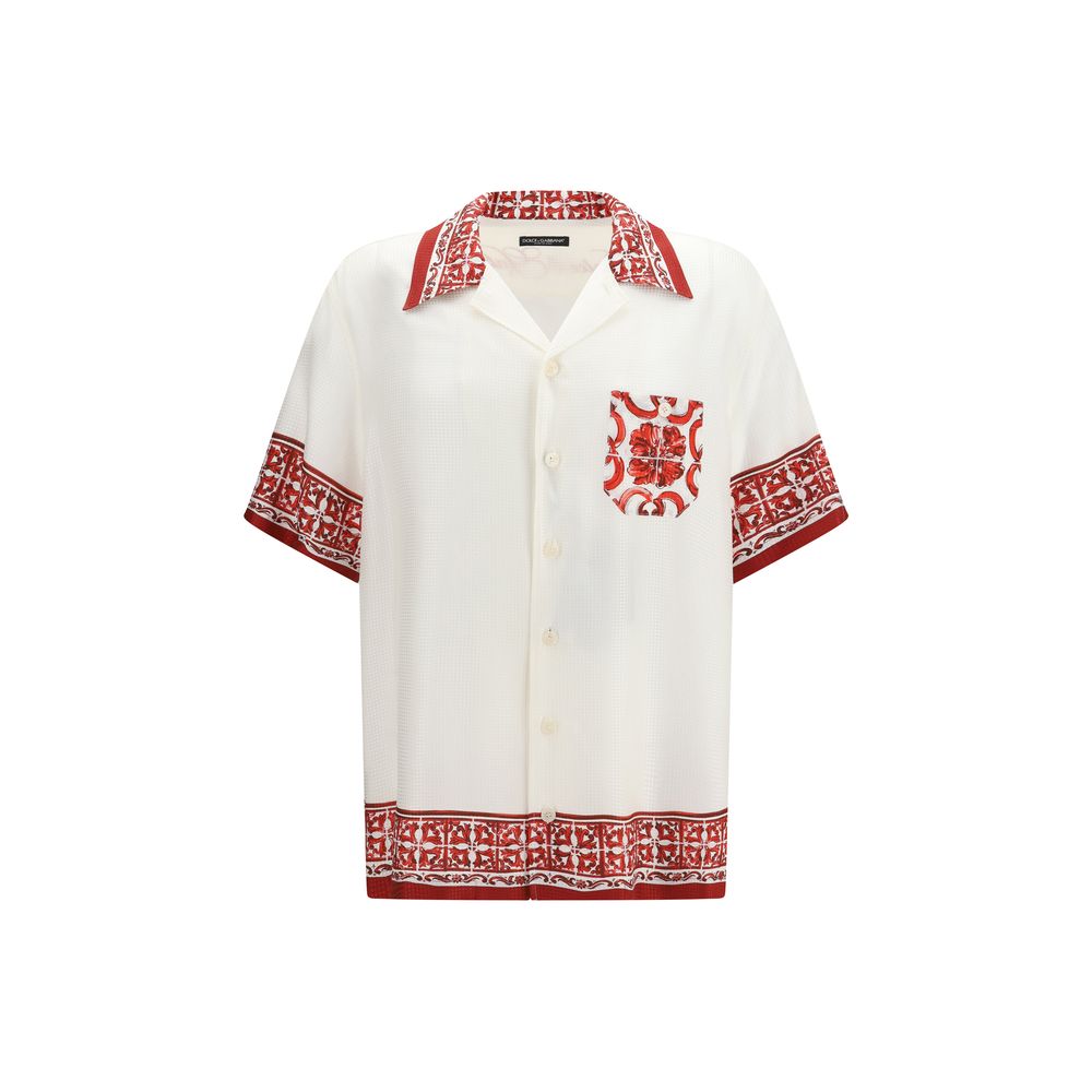 Indulge in the exquisite allure of the Dolce & Gabbana White Silk Pattern Shirt, where fine silk meets artisanal majolica print, embodying timeless elegance and sophistication.