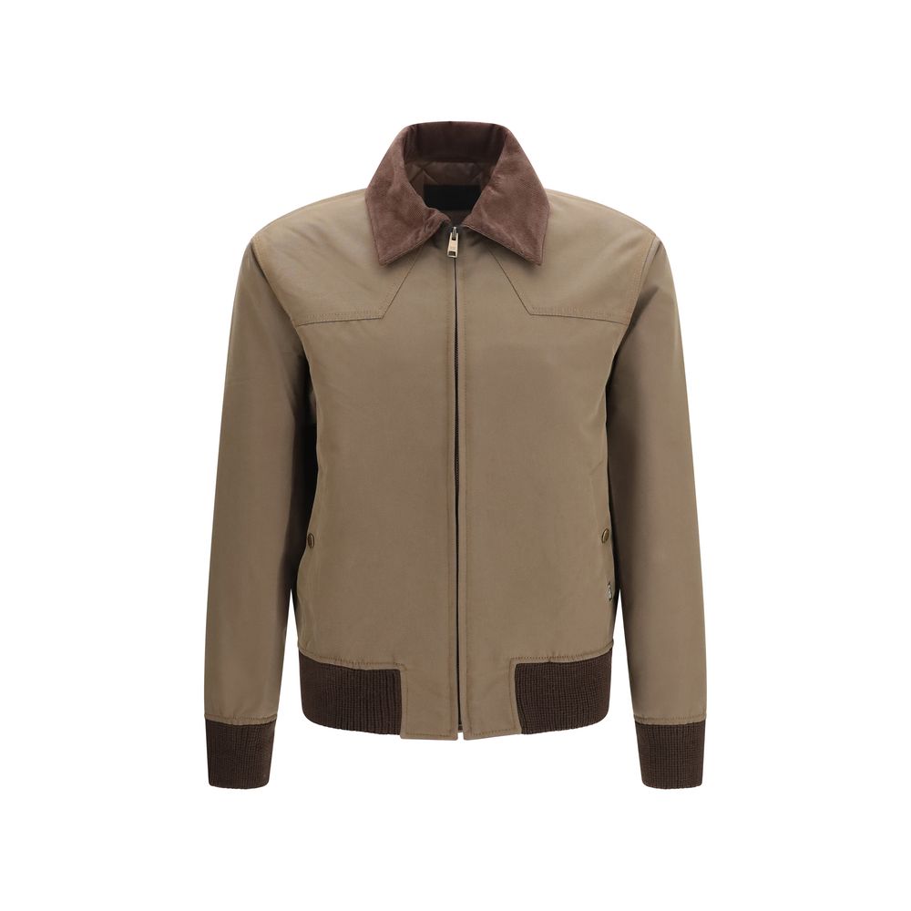 Indulge in the Prada Brown Cotton Full-Length Jacket, where exquisite craftsmanship meets timeless elegance, perfect for those who embody sophistication and allure.