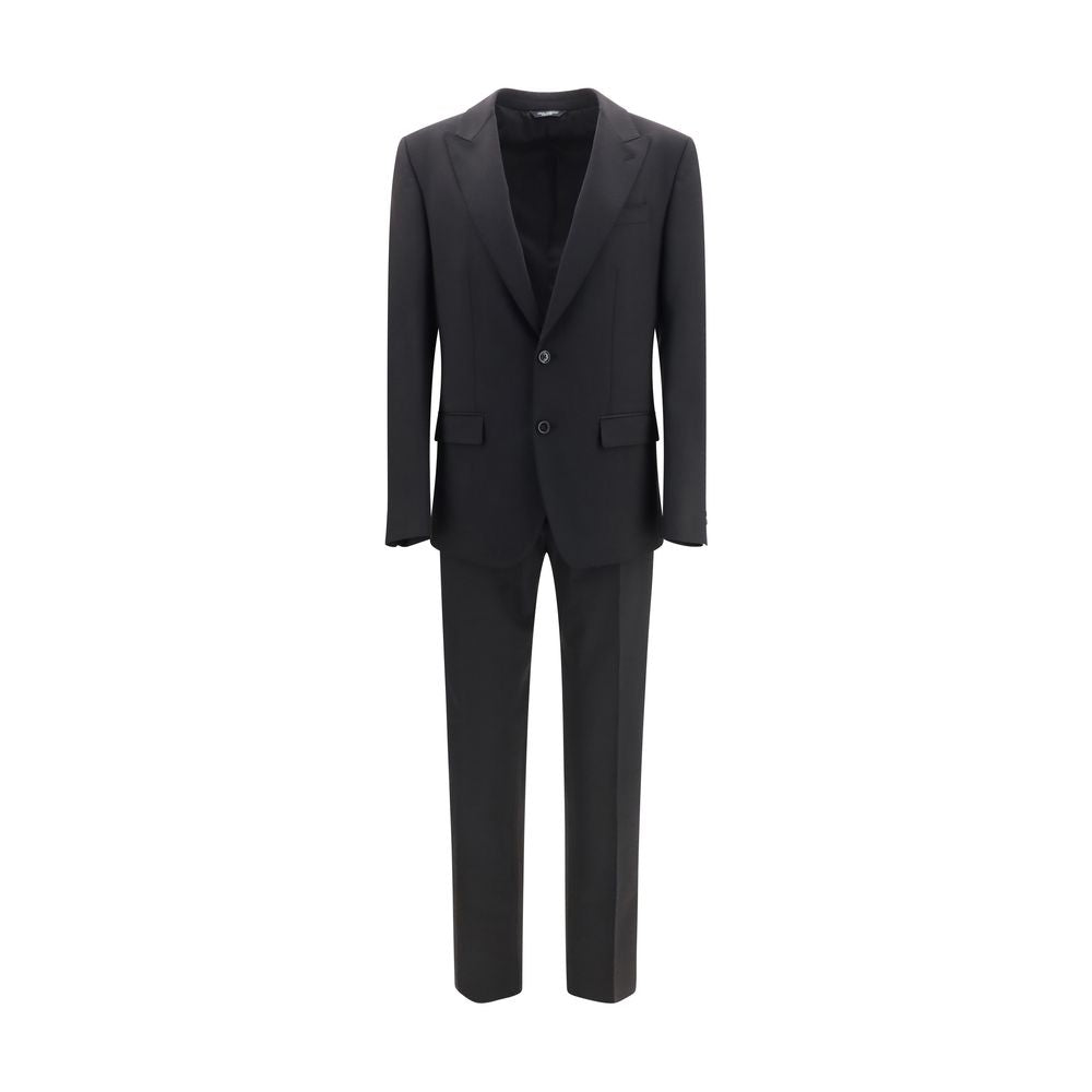 Discover the Dolce & Gabbana Black Wool Oves Aries Two-Piece Suit, a masterpiece of Italian craftsmanship, embodying elegance and sophistication for the discerning individual.
