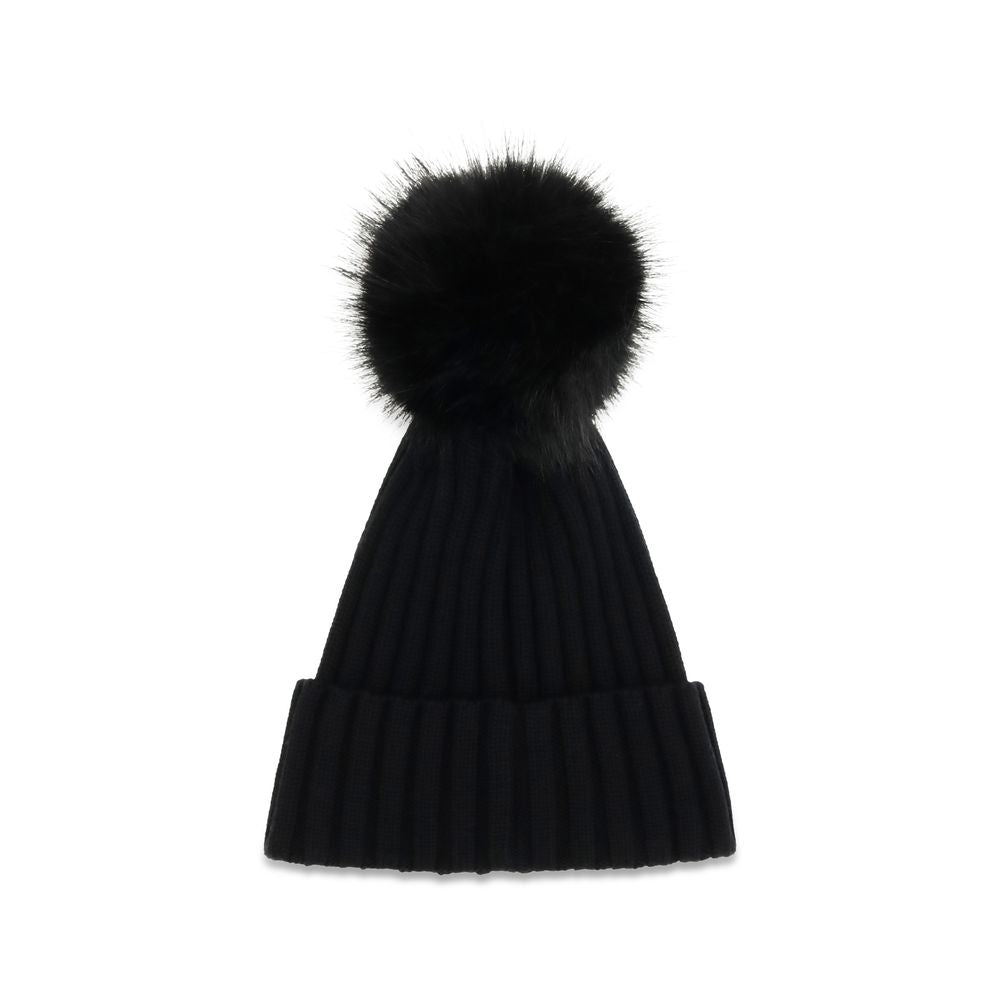 Indulge in the Moncler Black Wool Oves Aries Beanie, a luxurious accessory crafted from virgin fleece wool, blending warmth with refined elegance for the discerning individual.