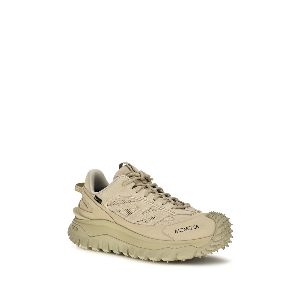 Experience the exquisite craftsmanship of Moncler's Beige Calf Leather Bos Taurus Athletic Sneakers, where luxury meets performance in a timeless design for discerning individuals.