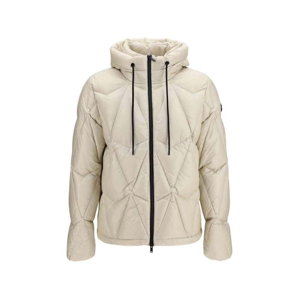 Indulge in the exquisite Moose Knuckles Beige Nylon Full-Length Jacket, a masterpiece of quilted luxury, designed for those who embody elegance and sophistication.