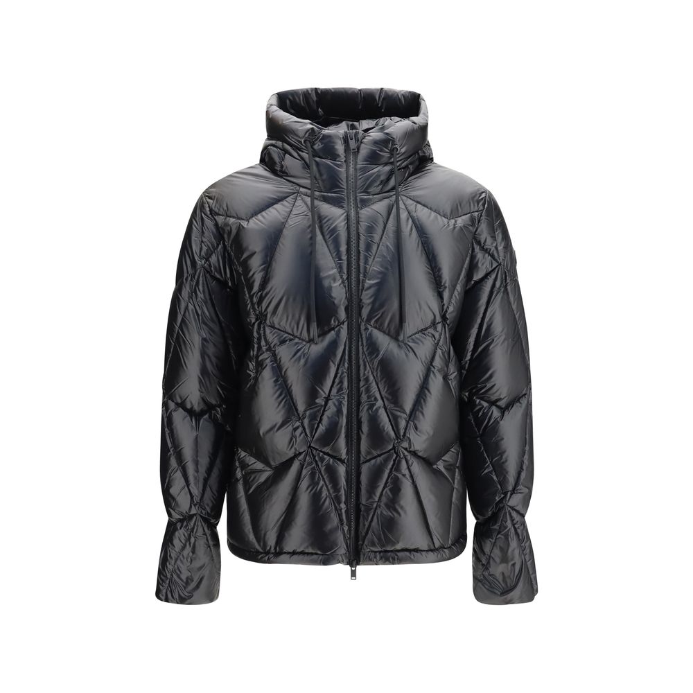 Indulge in the exquisite craftsmanship of the Moose Knuckles Black Nylon Shell Jacket, a luxurious oversized puffer that embodies sophistication and versatility for every discerning wardrobe.