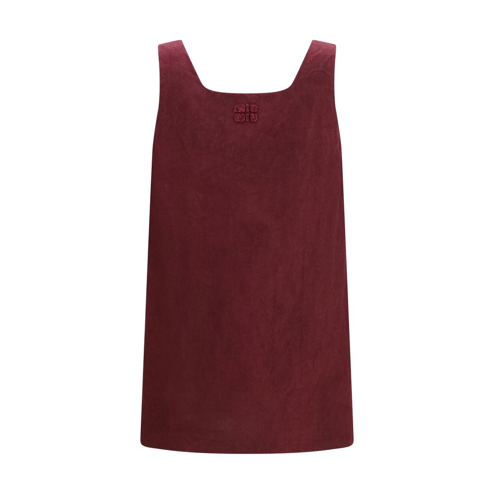 Indulge in the exquisite Miu Miu Bordeaux Linen Casual Dress, a masterpiece of refined craftsmanship and timeless elegance, perfect for the discerning individual.