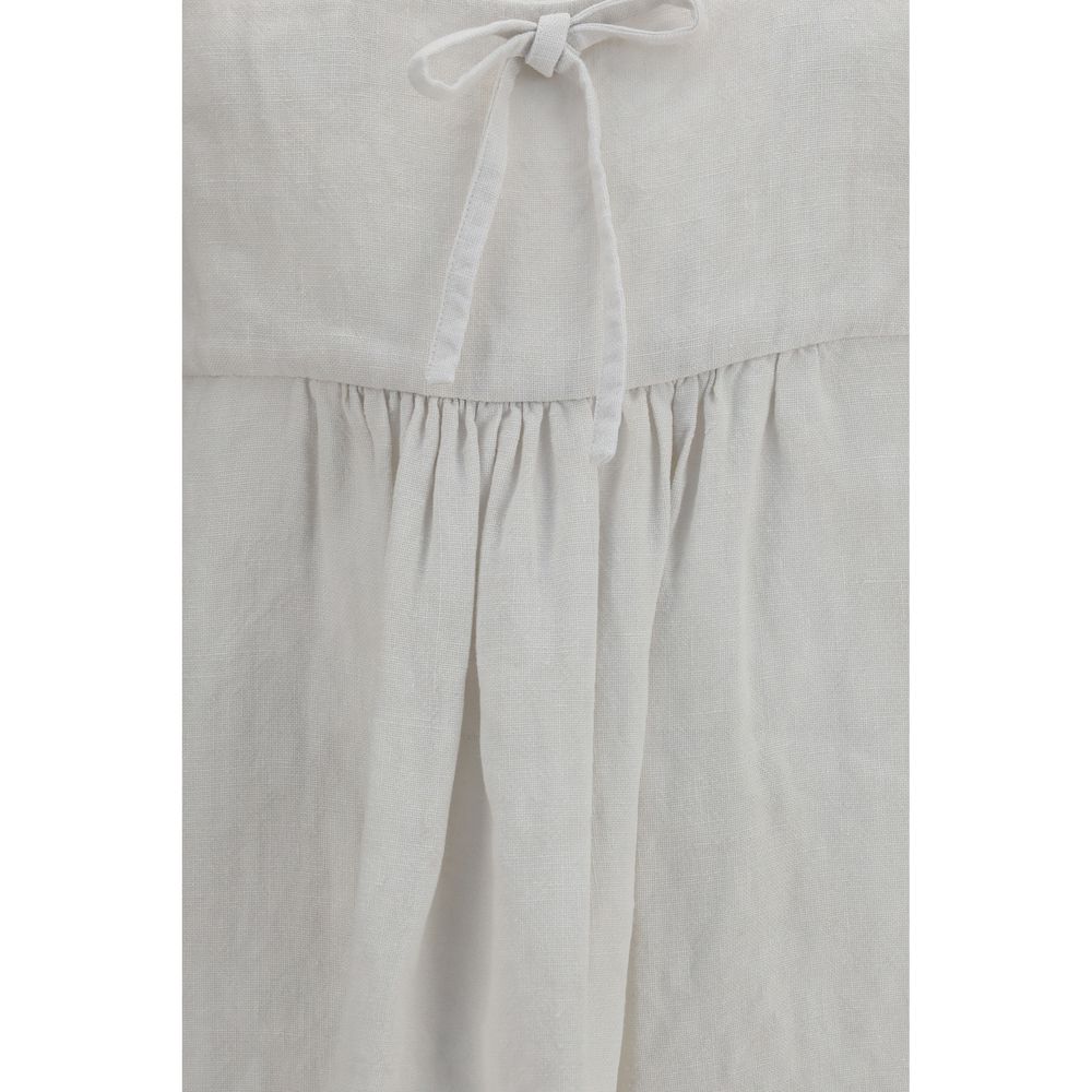 Embrace the allure of the Miu Miu White Linen Casual Dress, a masterpiece of exquisite craftsmanship and timeless elegance, perfect for the discerning individual.