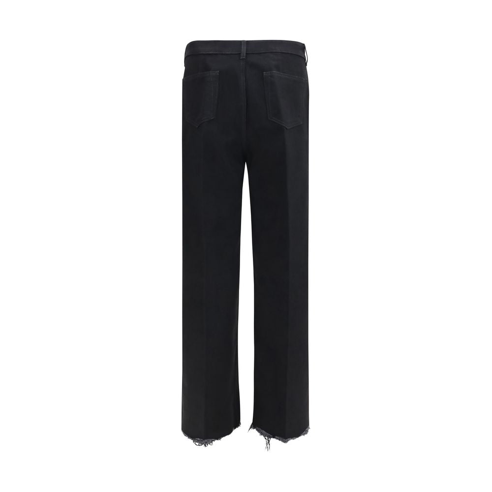 Elevate your wardrobe with Rick Owens Black Cotton Flared Jeans, a bold fusion of contemporary design and luxurious craftsmanship, perfect for the discerning fashion connoisseur.