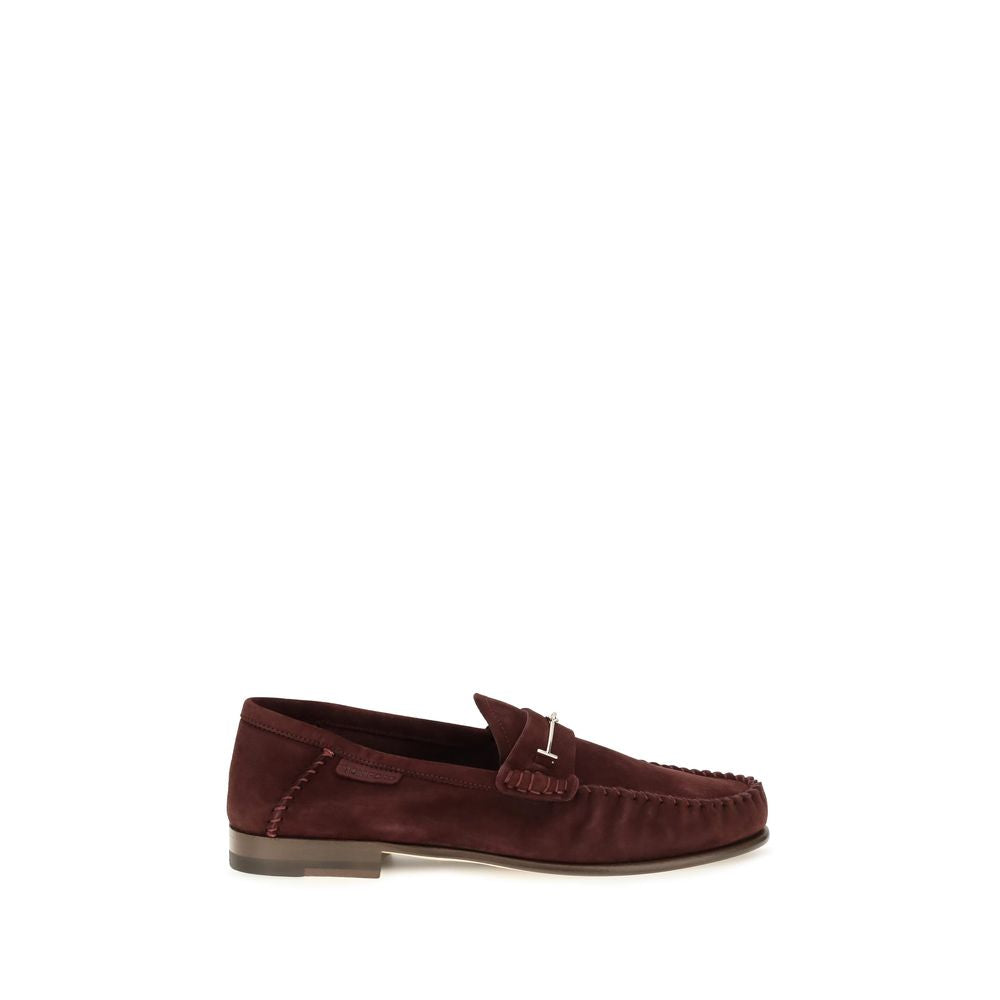 Indulge in the exquisite Tom Ford Bordeaux Calf Leather Bos Taurus Slip-On Loafers, where refined craftsmanship meets timeless elegance, perfect for the discerning connoisseur.