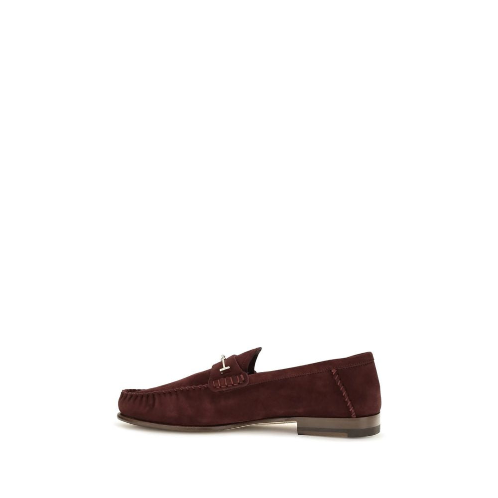 Indulge in the exquisite Tom Ford Bordeaux Calf Leather Bos Taurus Slip-On Loafers, where refined craftsmanship meets timeless elegance, perfect for the discerning individual.