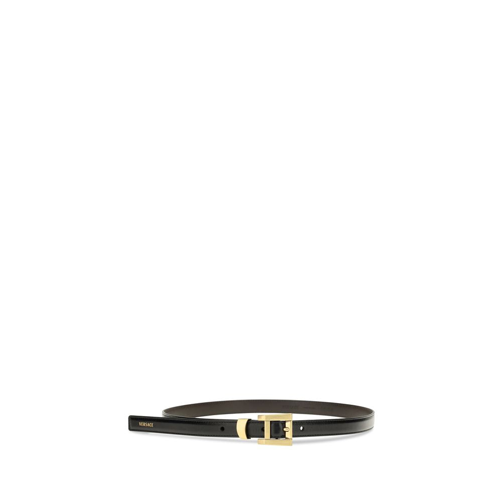 Experience the allure of the Versace Black Calf Leather Bos Taurus Regular Belt, a masterpiece of Italian craftsmanship that embodies timeless elegance and sophistication.