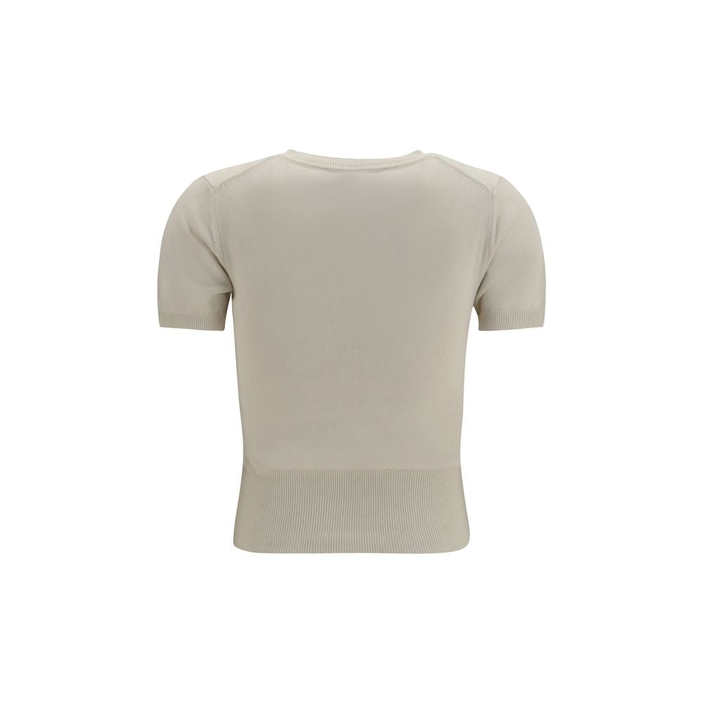 Indulge in the exquisite Bea Top by Vivienne Westwood, crafted from a luxurious cotton and cashmere blend, embodying refined elegance and effortless style for the discerning individual.