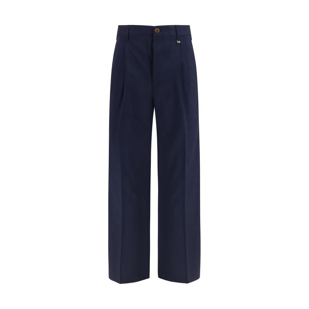 Discover the elegance of Vivienne Westwood's Blue Wool Oves Aries Dress Pants, crafted from virgin wool for a sophisticated, versatile silhouette that embodies luxury and refinement.