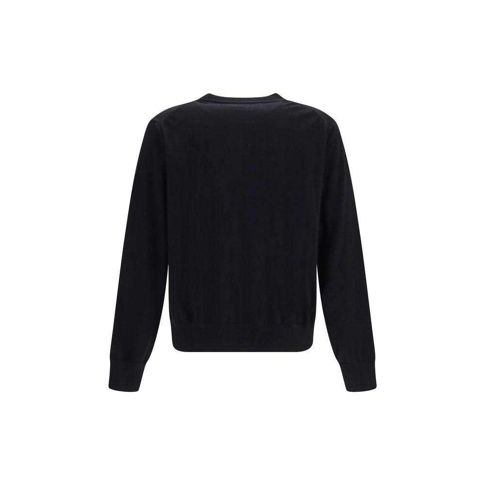 Indulge in the exquisite softness of the Vivienne Westwood Black Cashmere Sweater, where iconic design meets luxurious comfort, elevating your style to new heights.