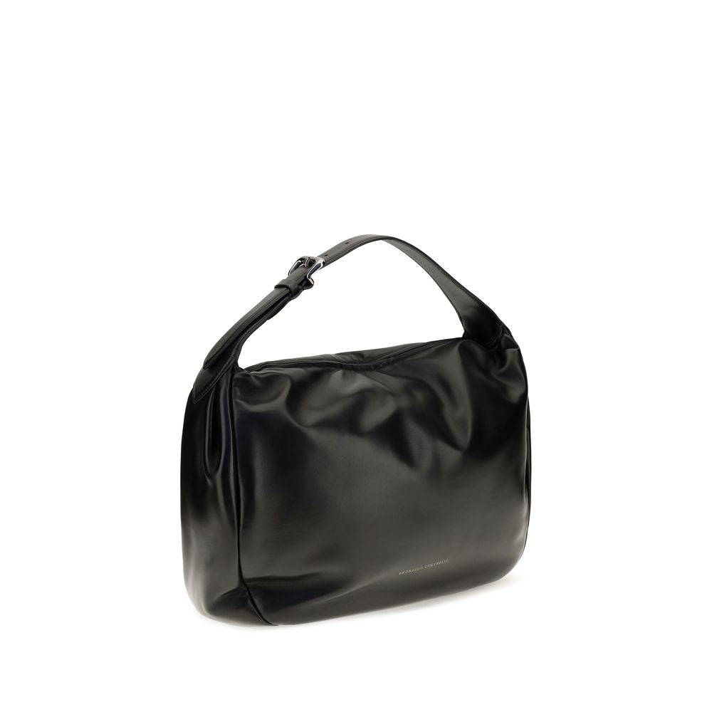 Indulge in the Brunello Cucinelli Black Calf Leather Bos Taurus Shoulder Bag, a testament to exquisite craftsmanship and timeless elegance, perfect for any sophisticated occasion.