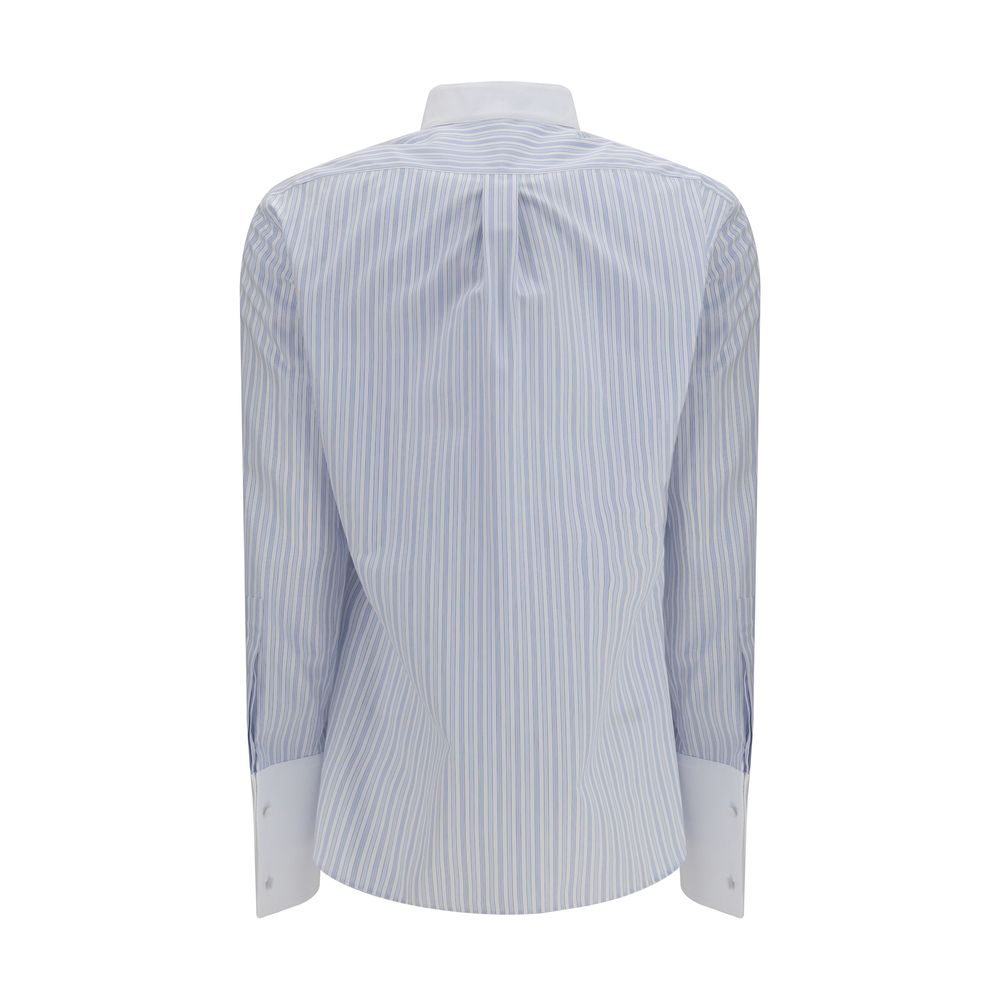 Elevate your wardrobe with the Tom Ford Blue Cotton Pattern Shirt, a masterpiece of exquisite craftsmanship and luxurious comfort, perfect for any sophisticated occasion.