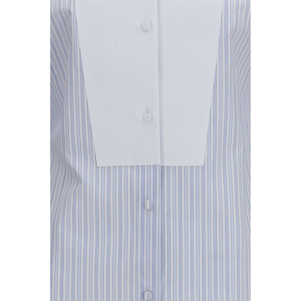 Discover the Tom Ford Blue Cotton Pattern Shirt, a masterpiece of 100% cotton craftsmanship, blending elegance and modernity for the discerning individual.