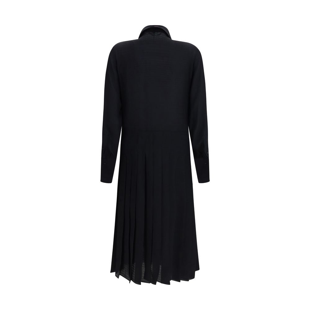 Indulge in the Fendi Black Silk Casual Dress, a masterpiece of Italian craftsmanship in 100% silk, embodying timeless elegance and sophistication for every occasion.