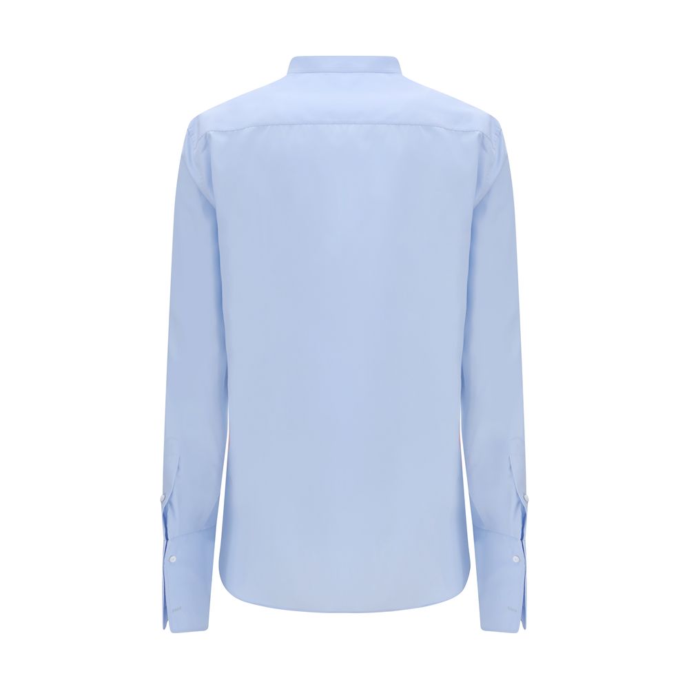 Elevate your wardrobe with the Fendi Blue Cotton Dress Shirt, a masterpiece of Italian craftsmanship in luxurious cotton, perfect for sophisticated occasions and effortless style.