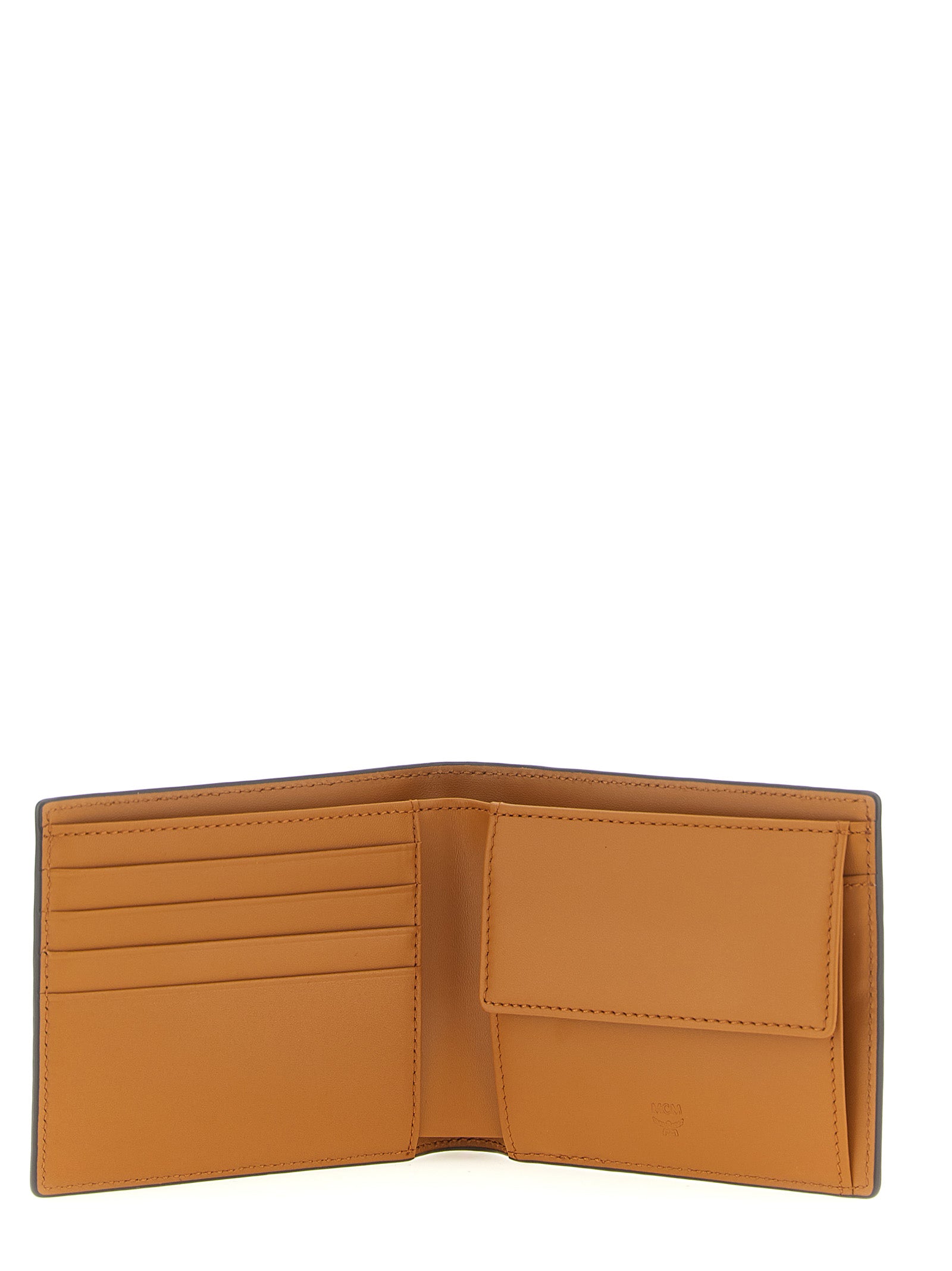 Elevate your elegance with the MCM Brown Polyethylene Wallet, a masterpiece of structured coated canvas, offering timeless sophistication and modern functionality.