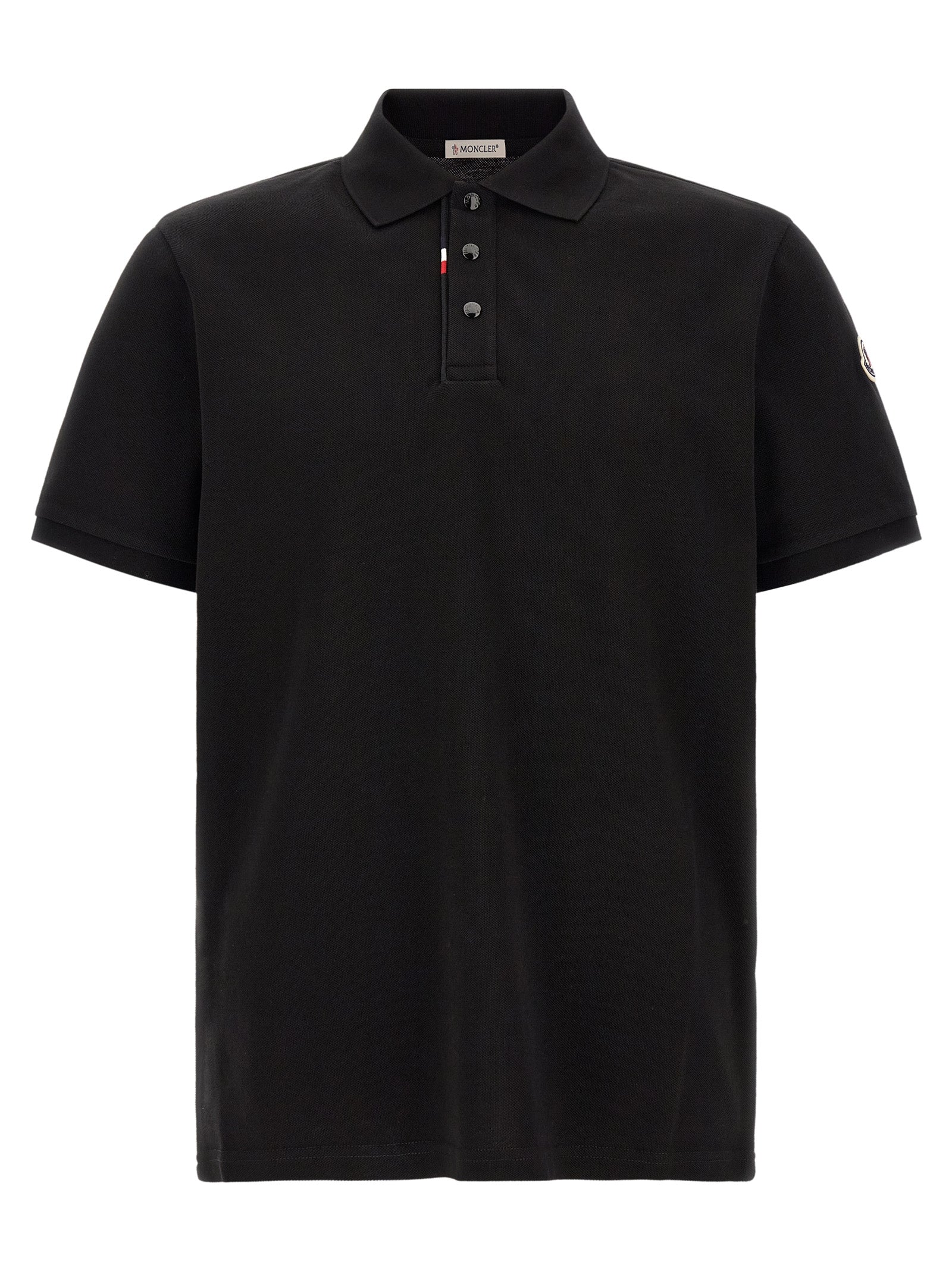 Experience the allure of the Moncler Black Cotton Polo Shirt, a testament to exquisite craftsmanship and timeless elegance, perfect for the discerning individual.