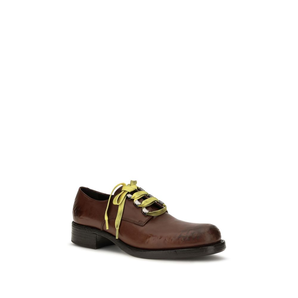 Prada Antique Leather Slip-On Loafers - Timeless Luxury Elegance