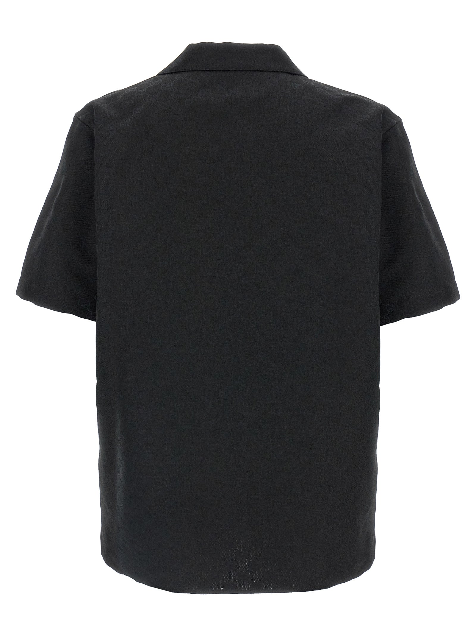 Elevate your wardrobe with the Gucci Black Linen Blouse, a masterpiece of Italian craftsmanship, perfect for making bold fashion statements with luxurious allure.
