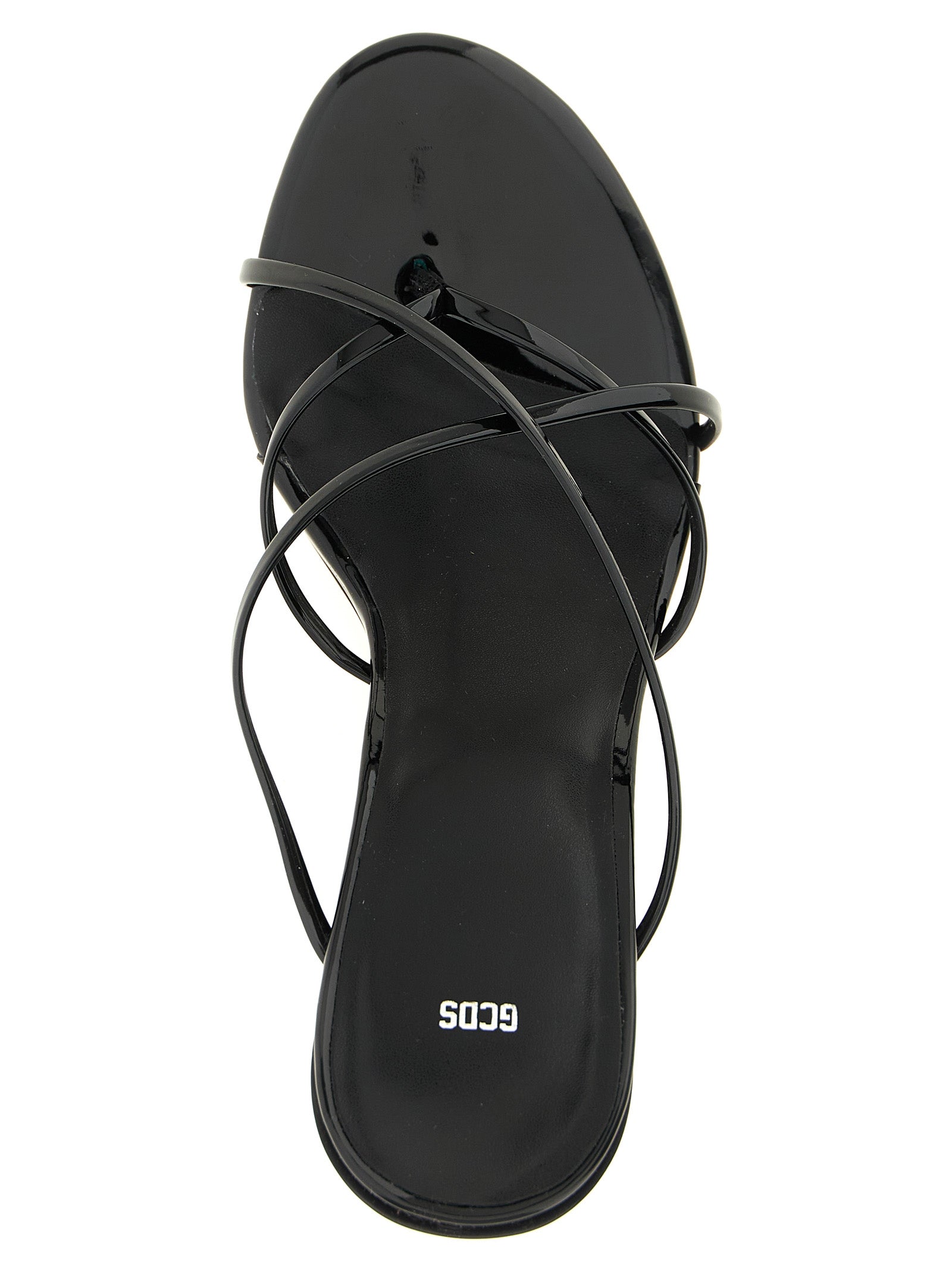 Step into the realm of elegance with GCDS Morso Thong Sandals, where high-shine patent leather meets architectural artistry, embodying luxury and sophistication.