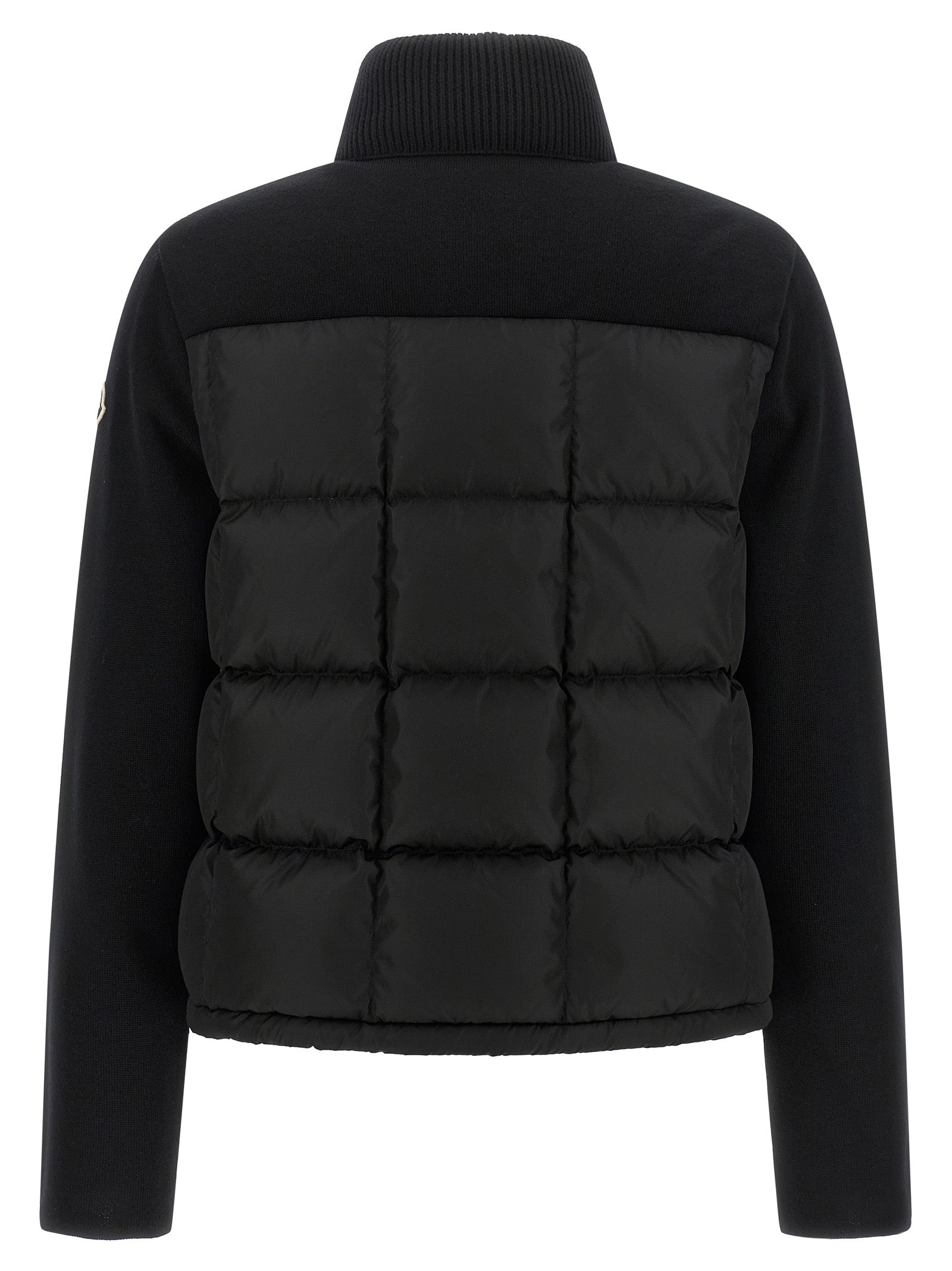 Discover the Moncler Black Virgin Wool Cardigan, a masterpiece of luxurious craftsmanship and modern elegance, perfect for those who embody sophistication and style.