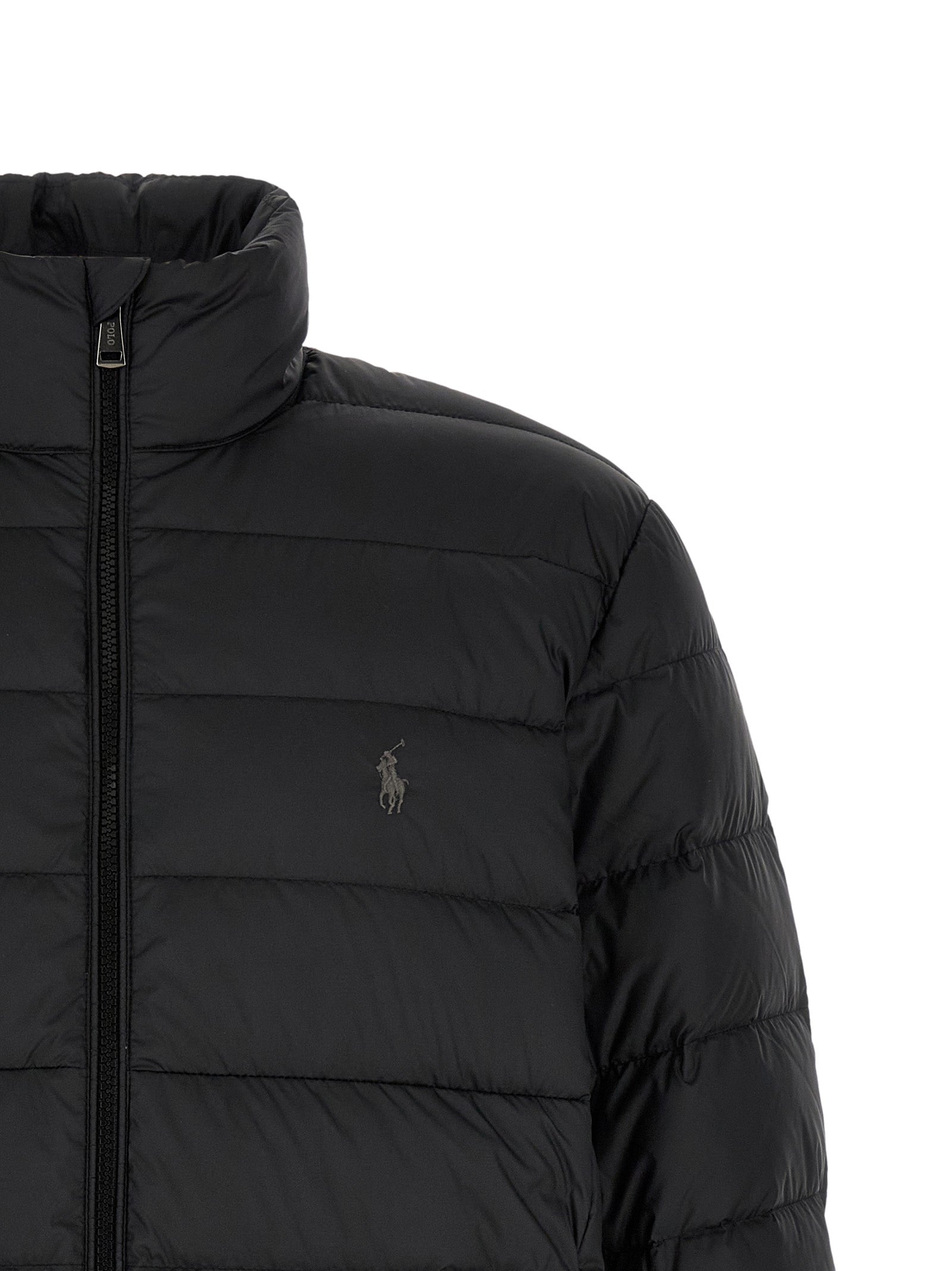 Discover the Polo Ralph Lauren Black Polyester Full-Length Jacket, a blend of elegance and functionality, crafted for those who appreciate timeless luxury and sophistication.