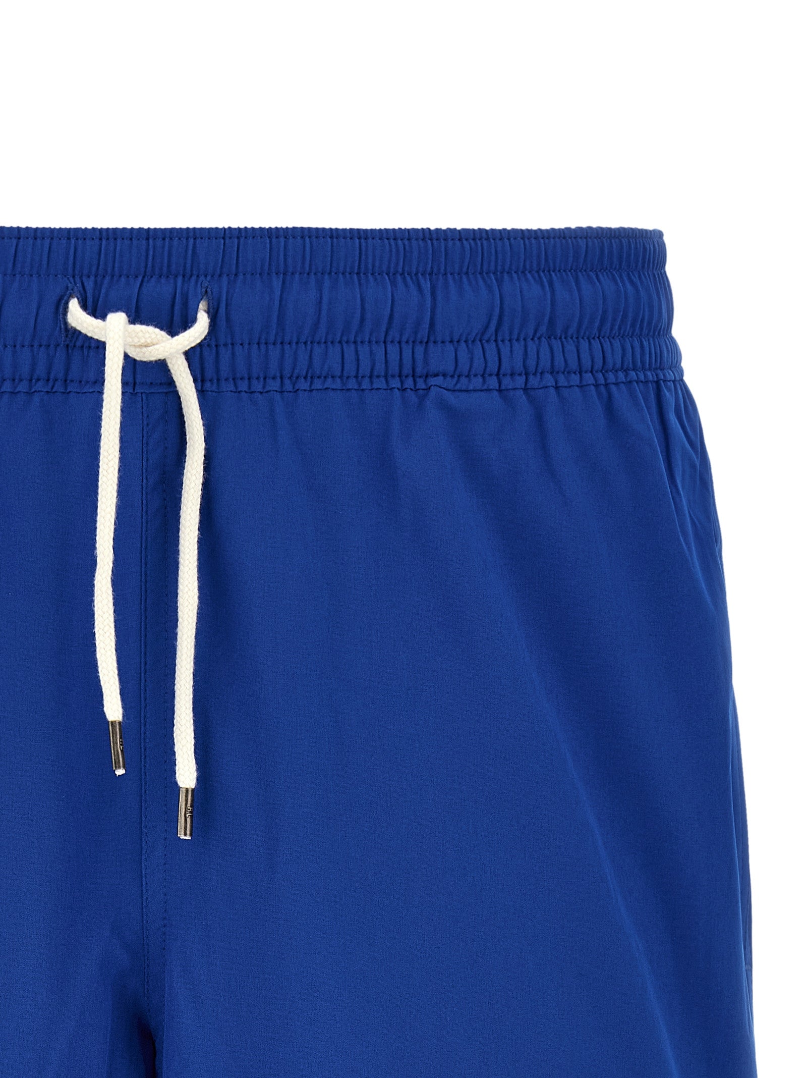 Indulge in the elegance of Polo Ralph Lauren's Blue Polyester Swim Shorts, where luxurious comfort meets timeless style, perfect for sophisticated poolside moments.