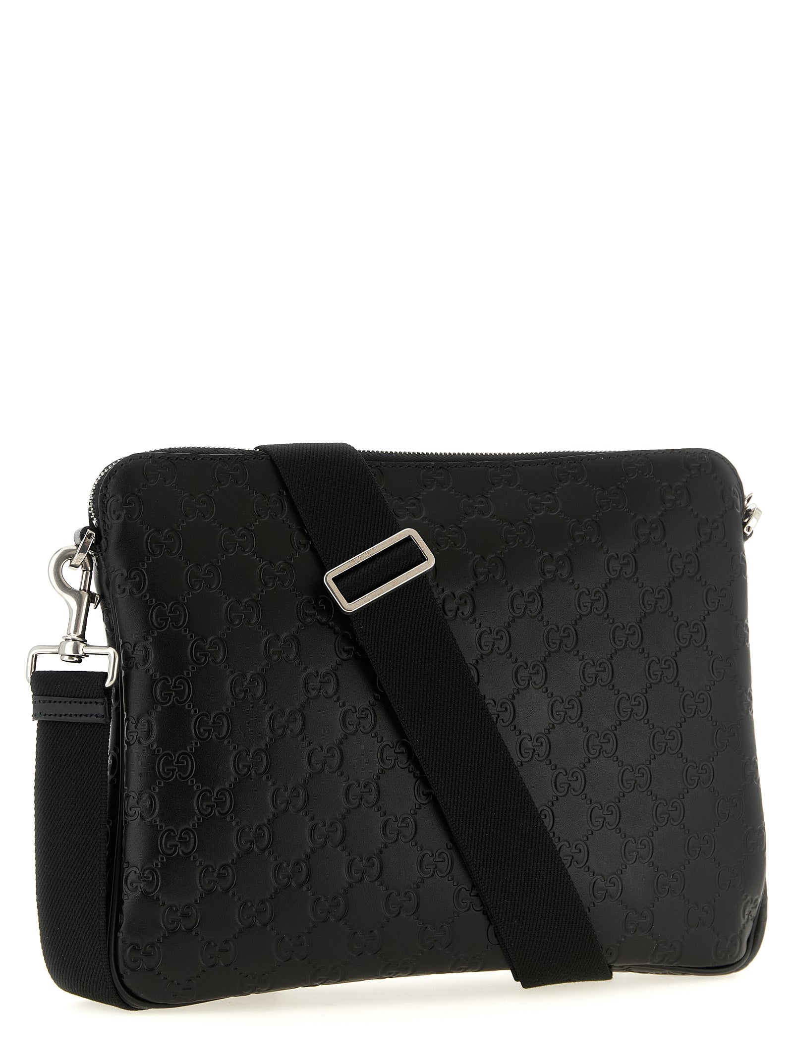 Elevate your style with the Gucci Black Calfskin Crossbody Bag, a masterpiece of Italian craftsmanship that embodies timeless luxury and sophistication.