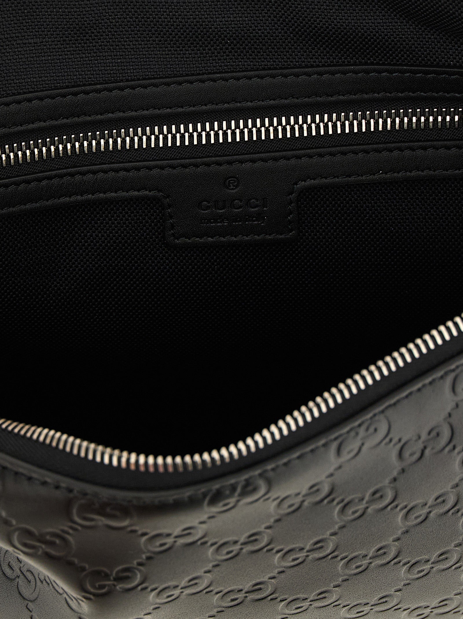 Indulge in the exquisite allure of the Gucci Black Calfskin Crossbody Bag, a masterpiece of Italian craftsmanship that embodies sophistication and timeless elegance.