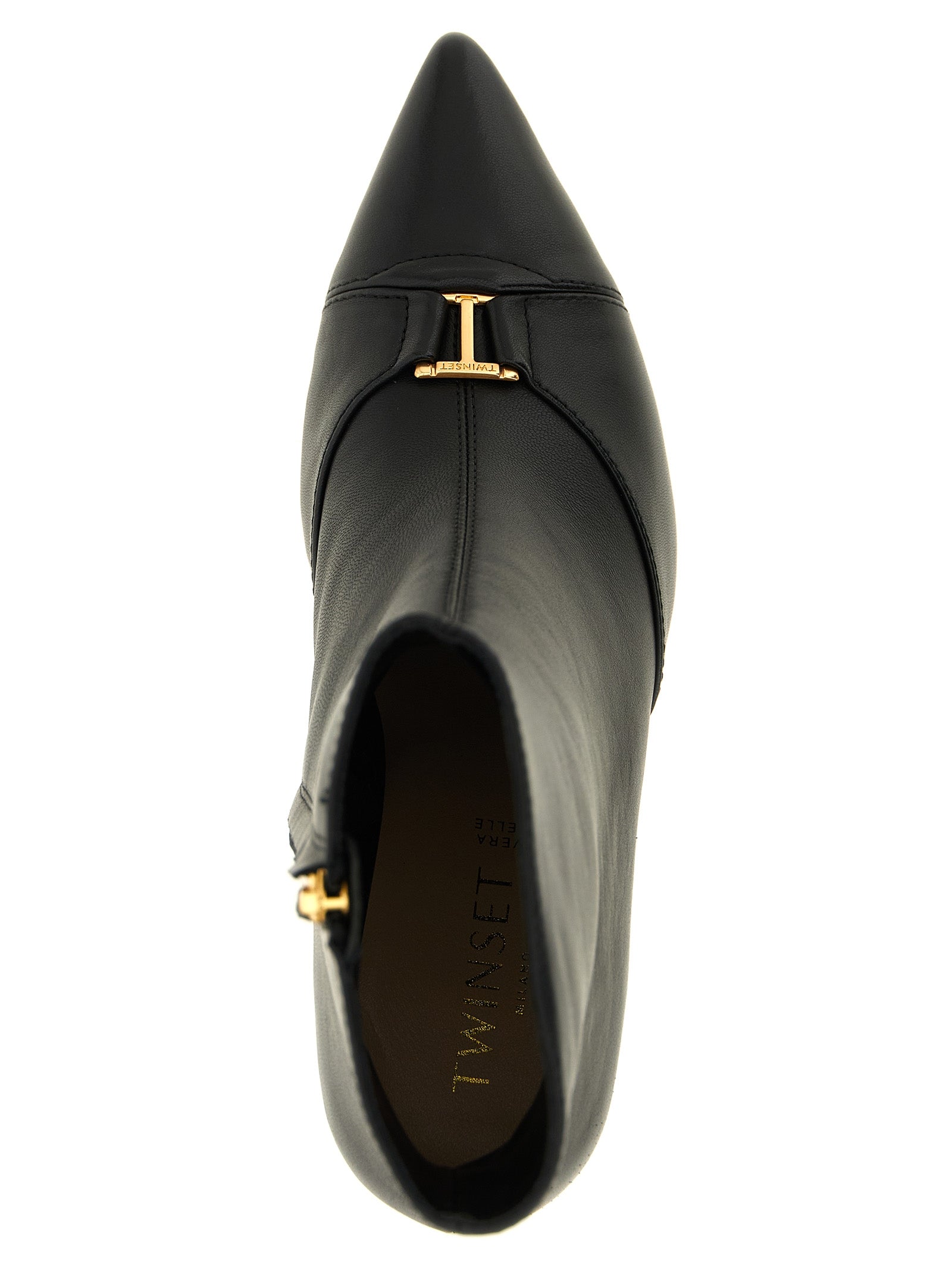 Indulge in the exquisite craftsmanship of Twinset Black Leather Ankle Boots, where luxurious leather meets sophisticated design, elevating your style to new heights.