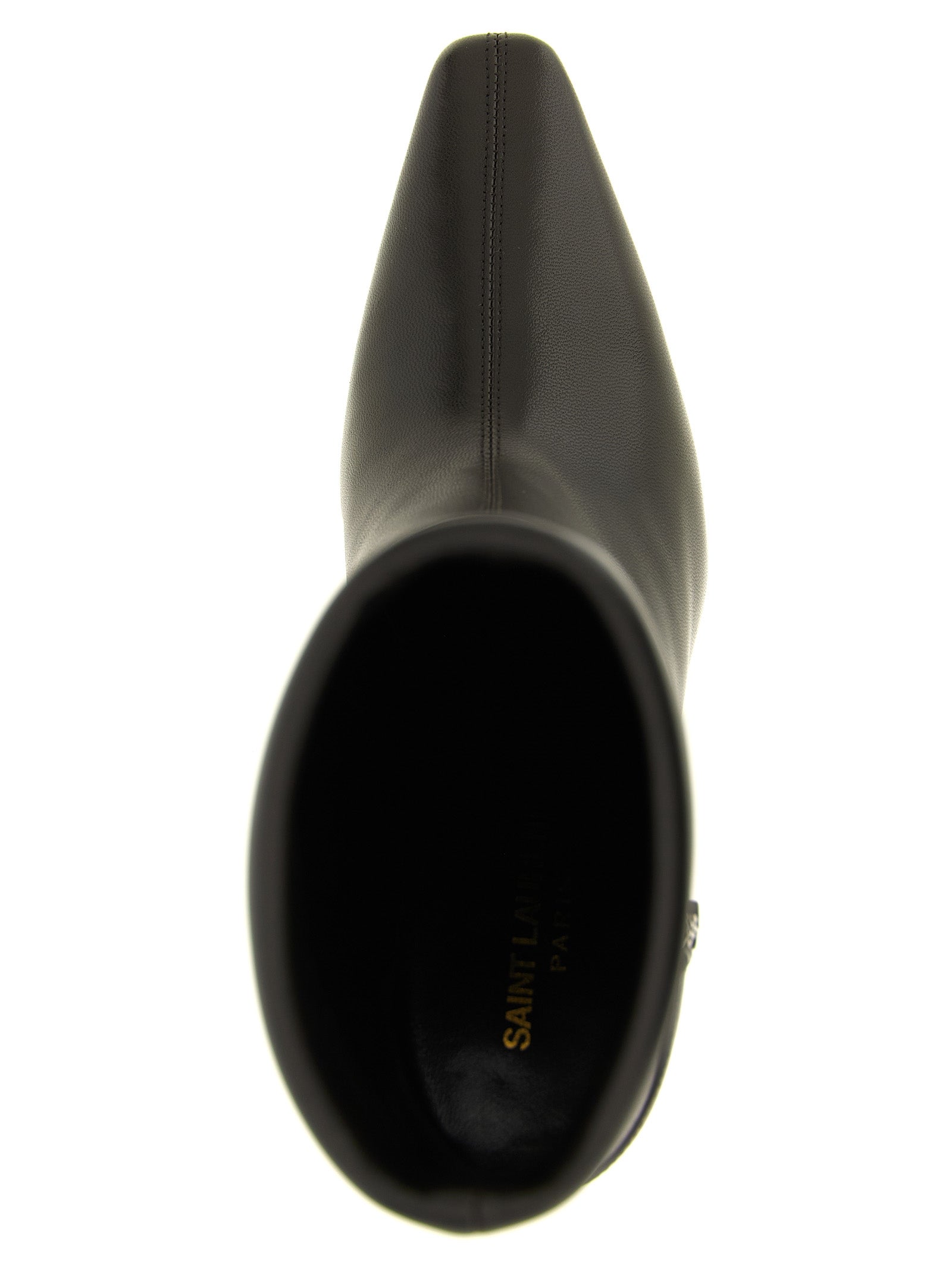 Step into elegance with Saint Laurent's Niki ankle boots, crafted from sumptuous lamb leather, embodying audacious luxury and timeless sophistication for the discerning trendsetter.
