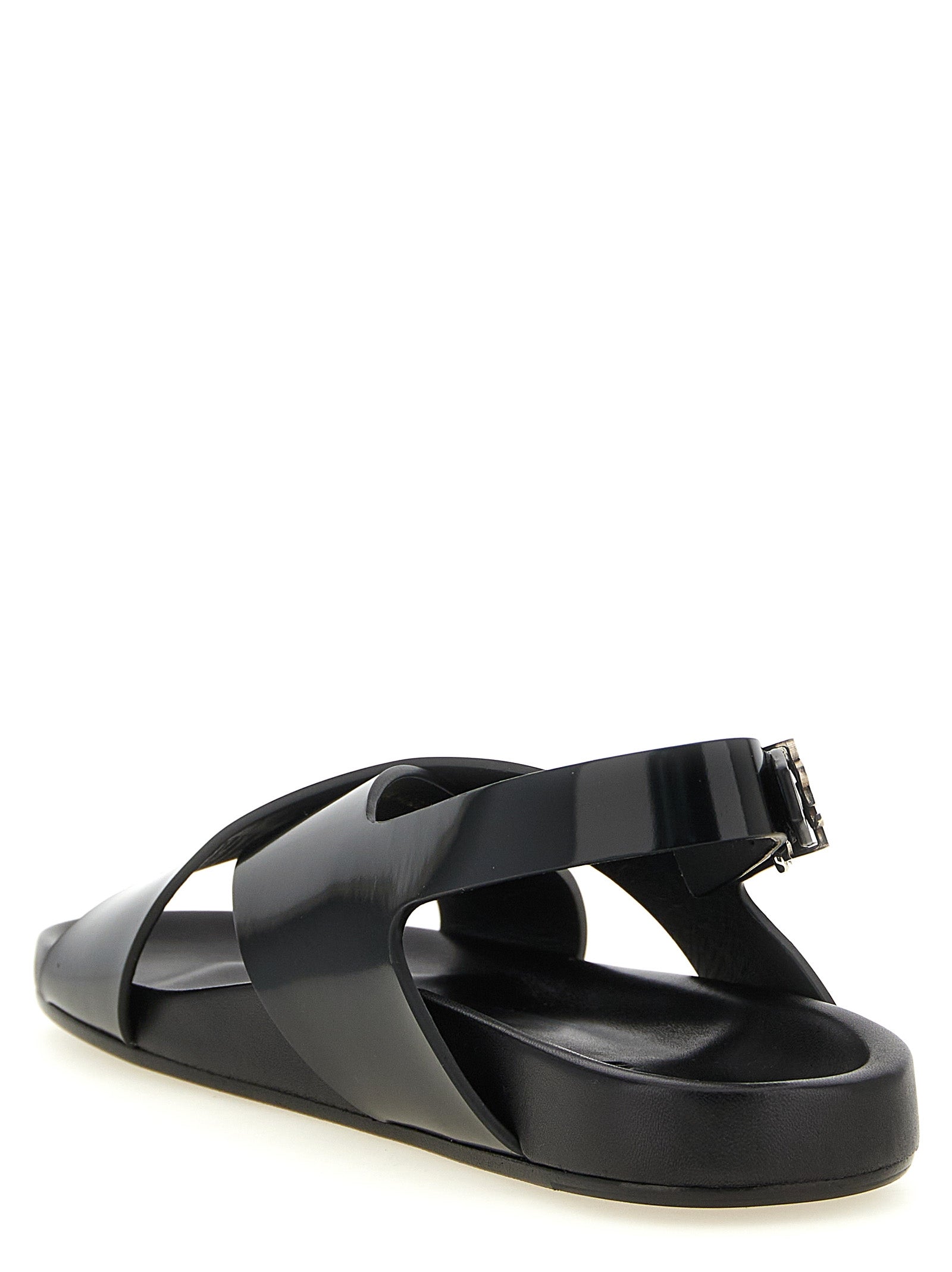 Experience the allure of Saint Laurent's Helios Black Calfskin Flat Sandals, where exquisite craftsmanship meets modern elegance, perfect for the discerning trendsetter.