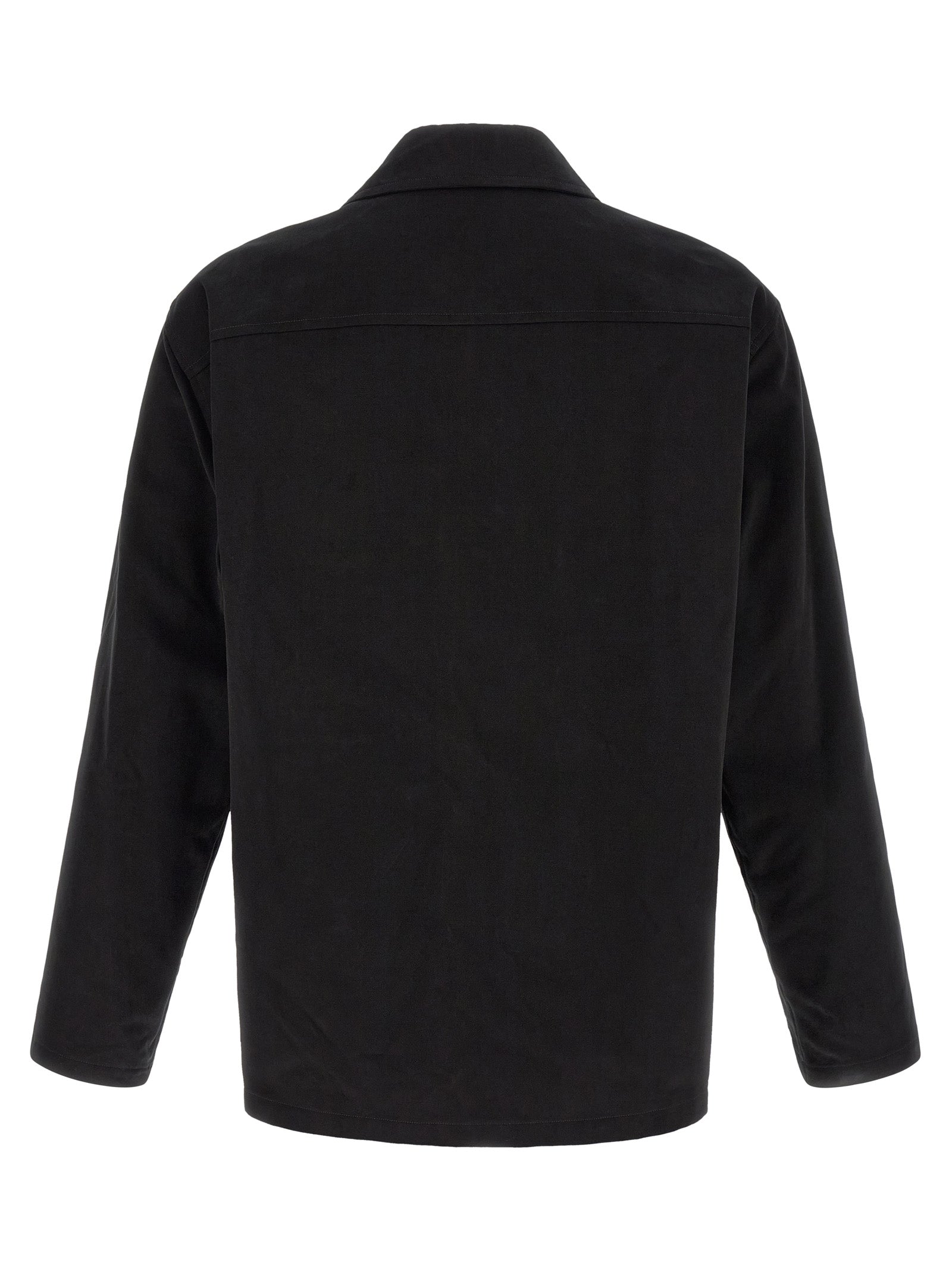 Elevate your wardrobe with the Saint Laurent Black Cotton Blouse, a blend of sophisticated design and luxurious comfort, perfect for the discerning individual.