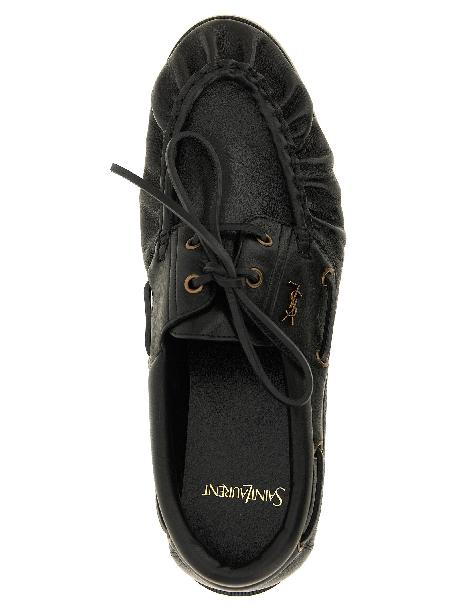 Elevate your style with Saint Laurent's Black Calfskin Slip-On Loafers, a masterful blend of timeless elegance and modern sophistication, crafted for the discerning individual.