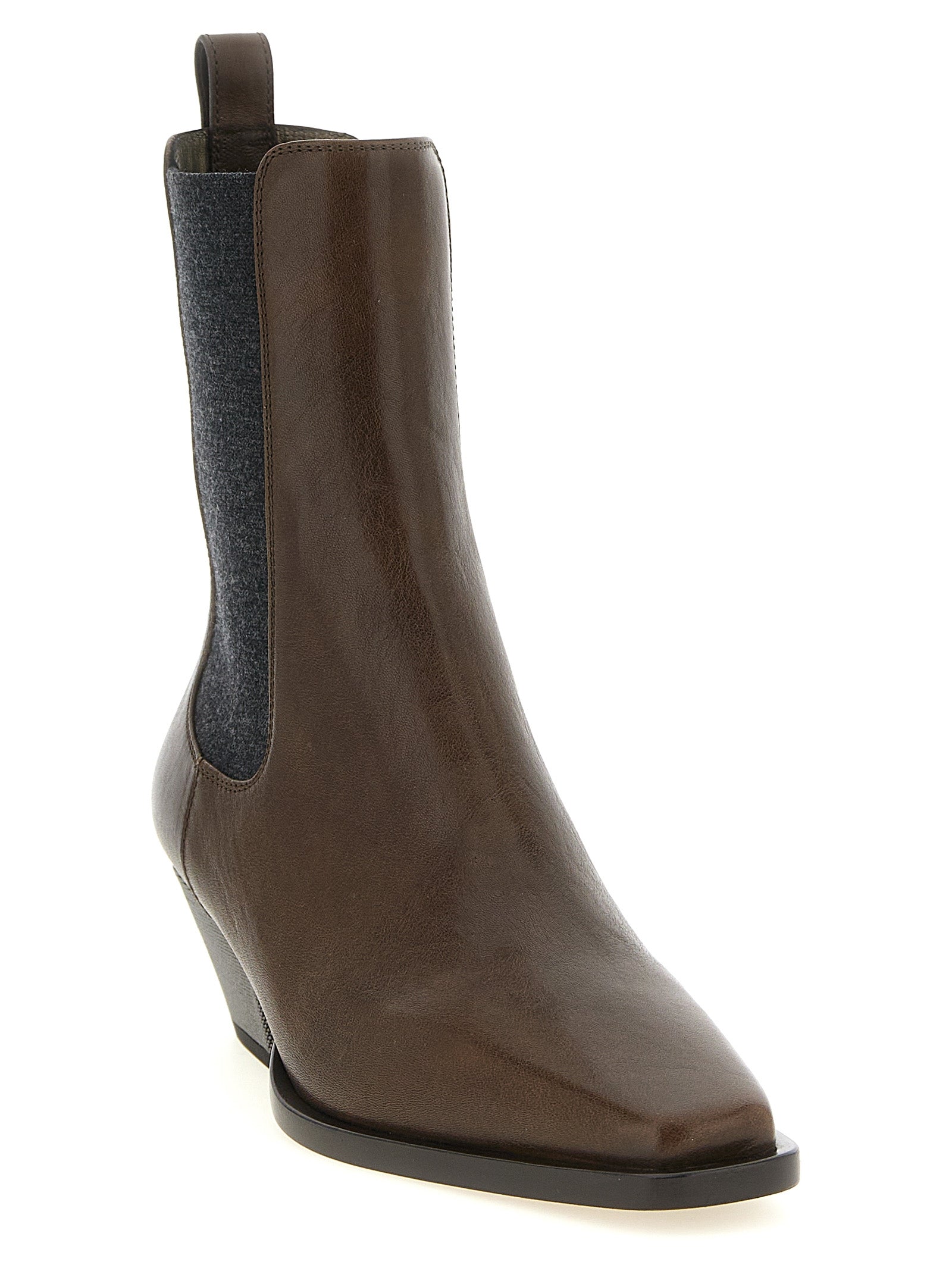 Indulge in the elegance of Brunello Cucinelli's Brown Cowhide Chelsea Boots, where exquisite craftsmanship meets timeless luxury, perfect for elevating any ensemble.