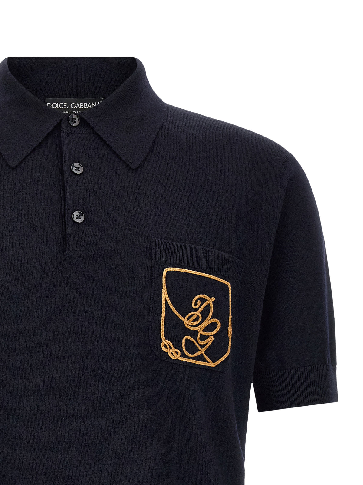 Elevate your wardrobe with the Dolce & Gabbana Blue Virgin Wool Polo Shirt, a testament to Italian craftsmanship and timeless elegance, perfect for any discerning individual.