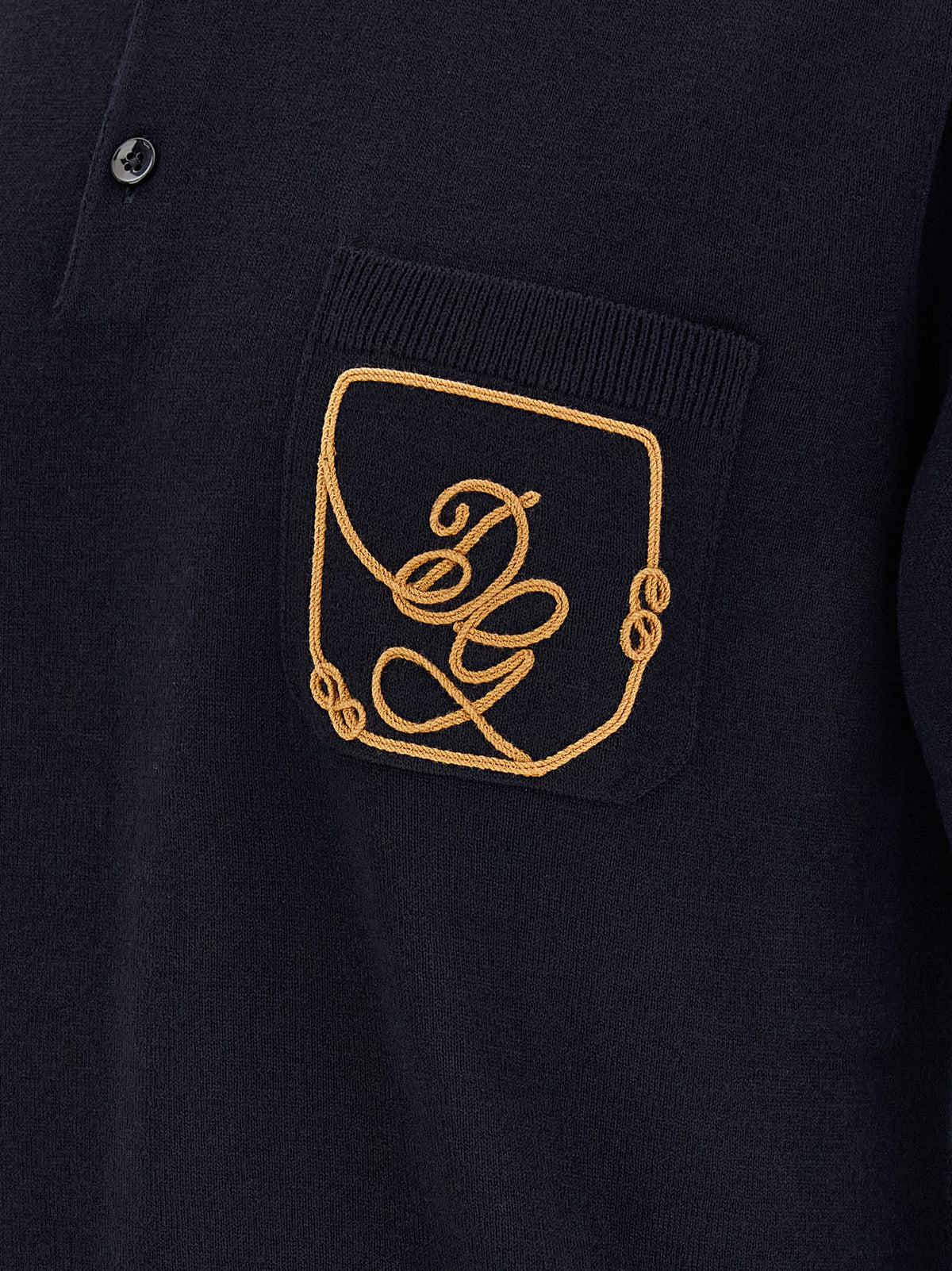 Indulge in the exquisite Dolce & Gabbana Blue Virgin Wool Polo Shirt, a testament to Italian craftsmanship and timeless elegance, perfect for the discerning wardrobe.