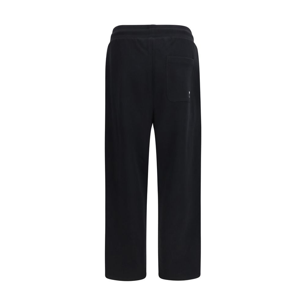 Elevate your wardrobe with Ami Paris Black Cotton Joggers, crafted from soft cotton for a refined, relaxed fit that embodies luxury and effortless style.