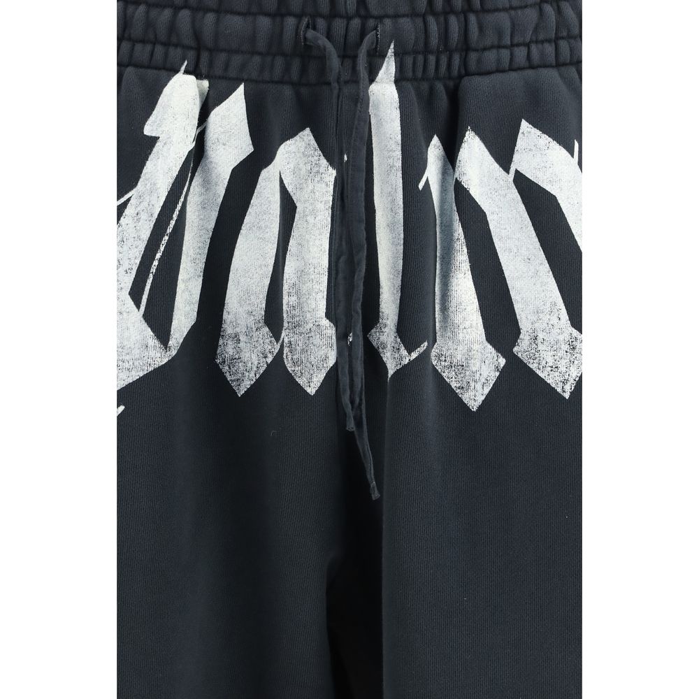 Indulge in the refined elegance of Palm Angels Gray Cotton Joggers, crafted from sumptuous cotton for unparalleled comfort and a contemporary silhouette that defines luxury.