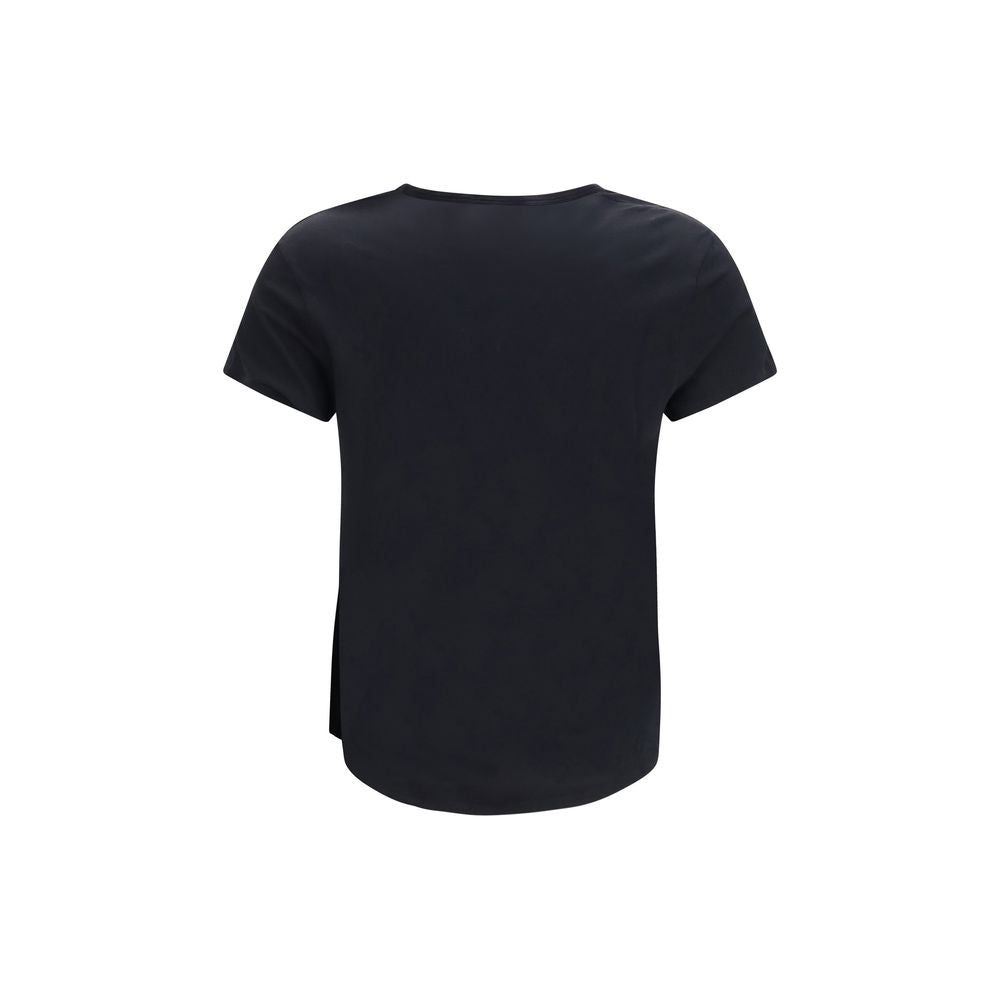 Elevate your wardrobe with the Fendi Black Cotton T-Shirt, crafted from 100% organic cotton jersey, embodying luxury and artistry for the discerning individual.